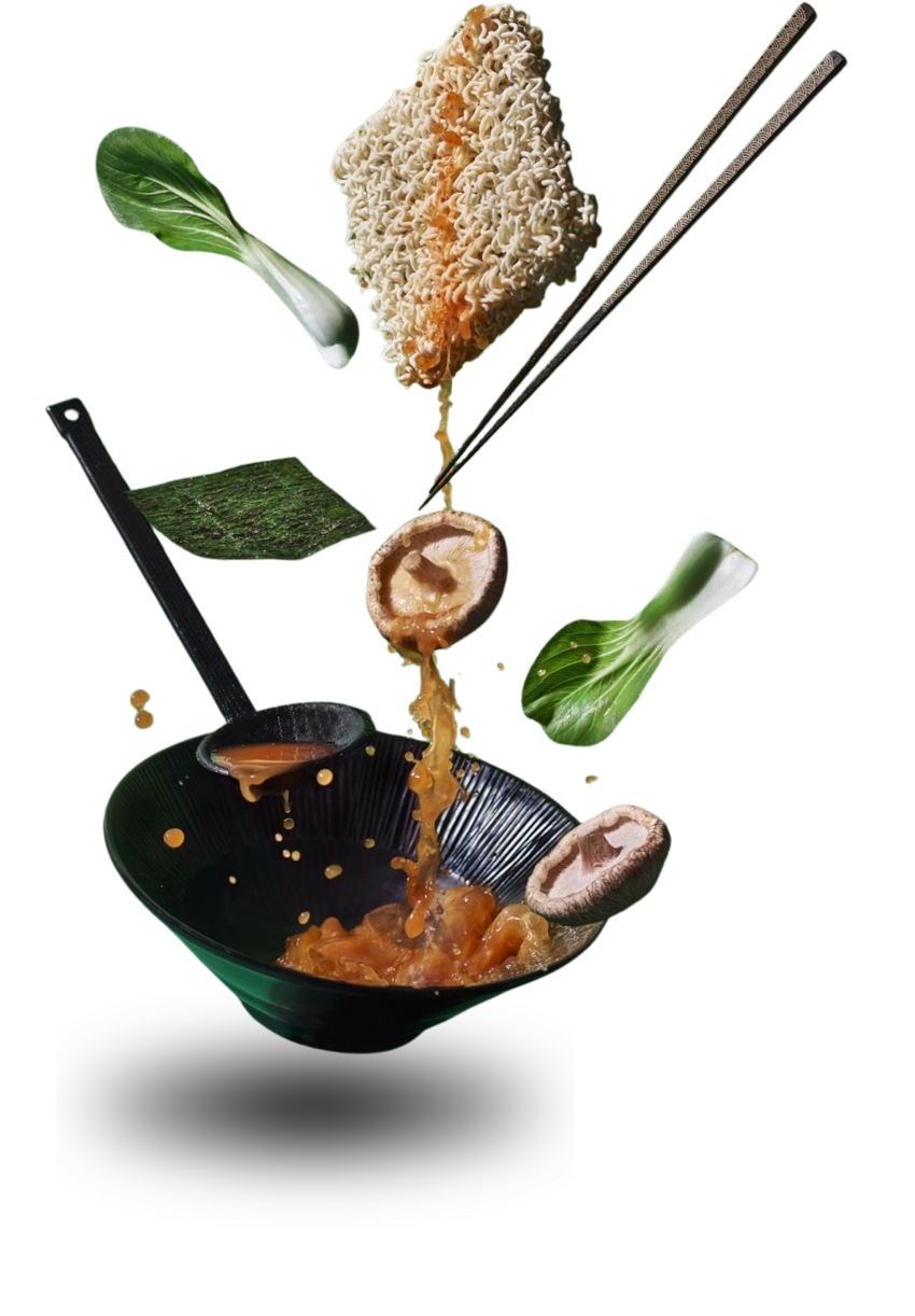 Fresh ingredients falling into a wok
